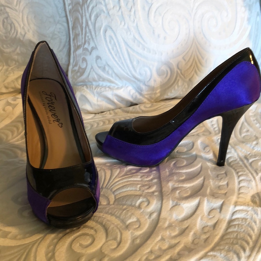 Forever purple and black open toe heels.